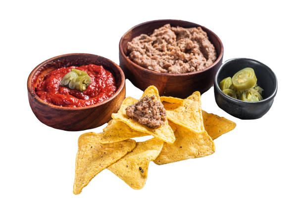 istock Nachos chips with tomato sauce and jalapeno, mexican appetizer. Isolated, white background. 1833142251