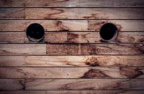 istock Brown wooden wall texture with portholes 1833142779