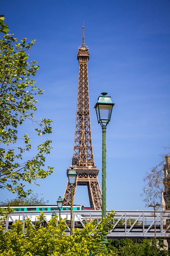 Eiffel Tower and subway on a bridge in Paris, France