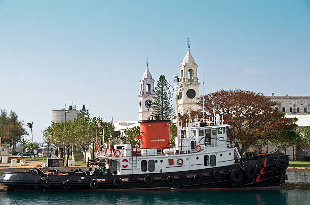 istock Clocktower and Tugboat at the Bermuda Dockyard 183314593