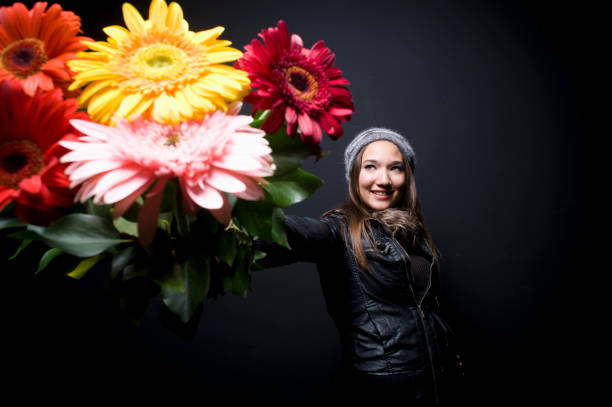 istock Young Woman with Flowers 183314638