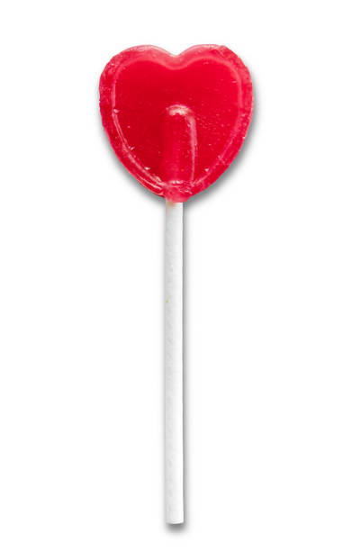 istock Red heart shaped lollipop isolated on white background 1833147559