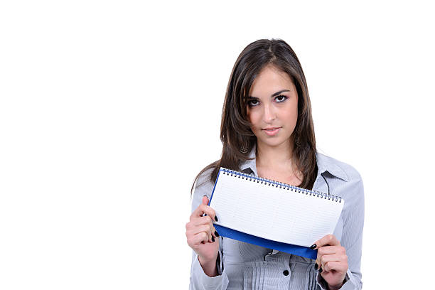 istock business woman showing notebook 183314988