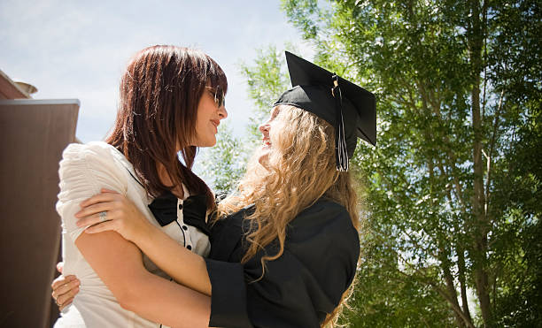 istock Happy New Graduate With Her Sister 183315163