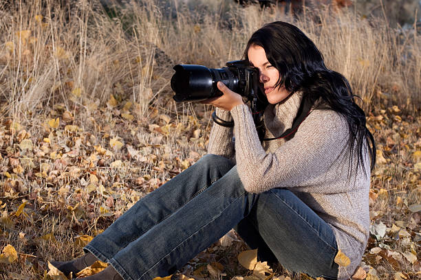 istock Female Nature Photographer Outdoors in Action 183315604