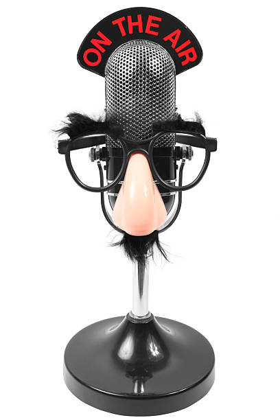 Microphone And Funny Gasses Microphone and funny glasses (Groucho Marx Disguise). Good for comedy concept, Stand up comedy concept, Halloween concept and happy concept. groucho marx disguise stock pictures, royalty-free photos & images