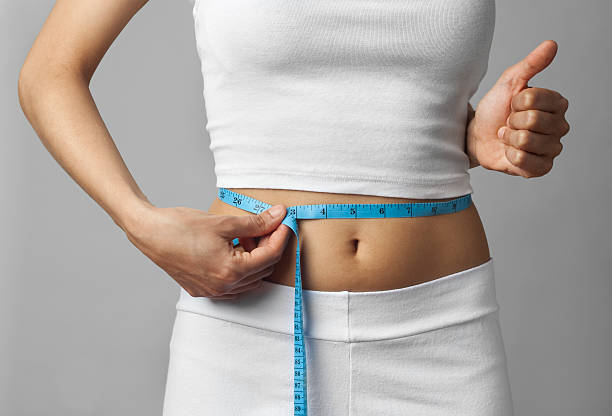 istock Losing weight thumbs up 183315891