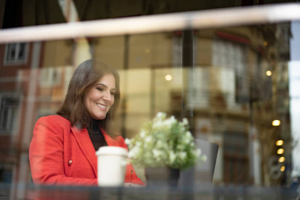 istock Young woman having a video call on laptop 1833162042