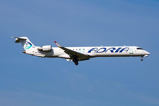 Vienna, Austria - May 20, 2018: Adria Airways Bombardier CRJ-900 S5-AAK passenger plane arrival and landing at Vienna Airport