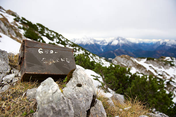 Geocache in the mountains stock photo