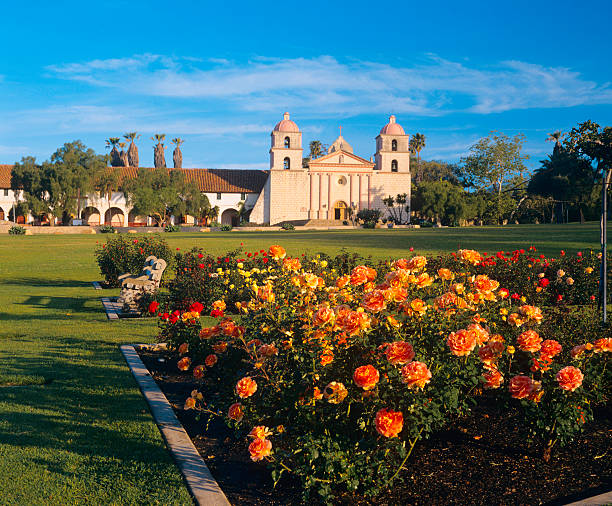 Santa Barbara Mission A rose garden grows in front of  the Santa Barbara Mission. santa barbara california stock pictures, royalty-free photos & images