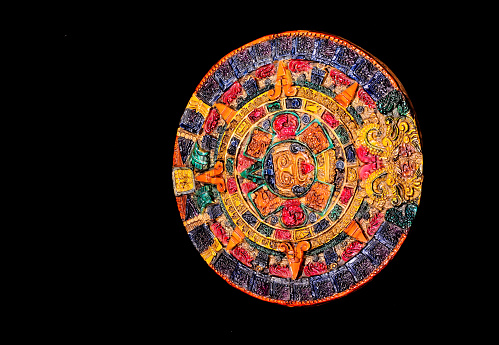 Typical Colored Clay Maya Calendar Isolated on Blackbackground