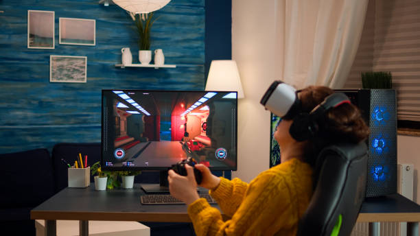 istock Woman esport cyber playing online game with virtual reality headset 1833187769