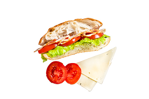 Deli meat sandwich with turkey ham, cheese, tomato and Lettuce.  Isolated, white background