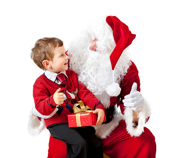istock santa claus with small boy 183319300