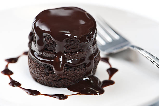 fotografii de stoc, fotografii și imagini scutite de redevențe cu tort de ciocolata calda - chocolate icing