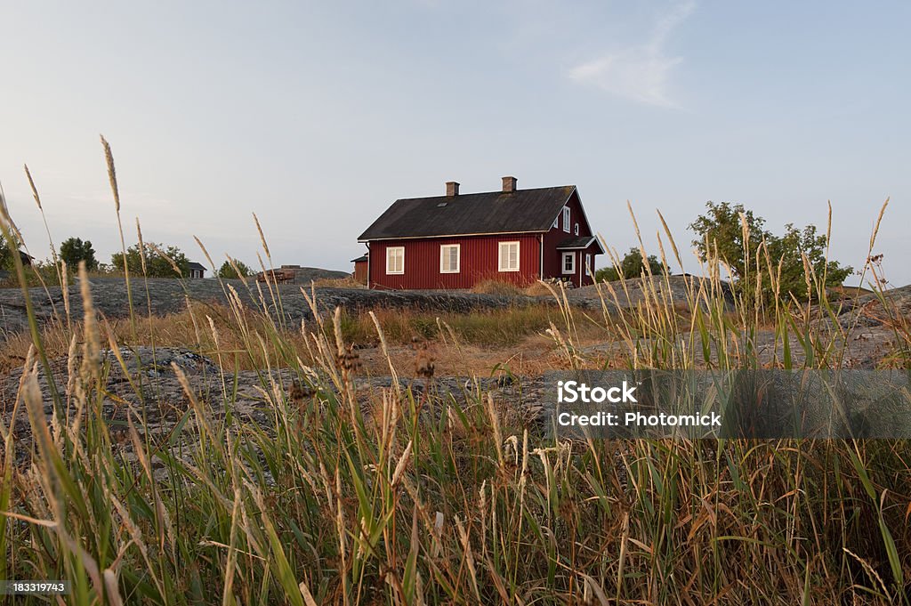 Sunset in the archipelago The last rays of the evening sun hit the cottages on a small island in the outer archipelago.Similar images: House Stock Photo