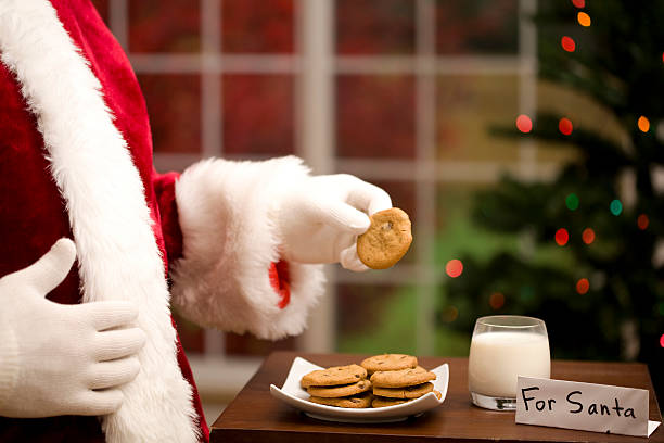 istock Santa Clause and cookies 183320054