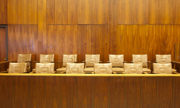 Wooden paneled courtroom jury box stock photo