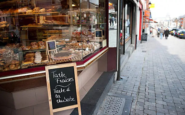 "Bakery with delicious treats in the window in Bastogne, Belgium"