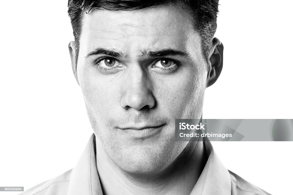 Young Male Portrait Black and white portrait of a young man on a white background.http://s3.amazonaws.com/drbimages/m/dordar.jpg Black And White Stock Photo