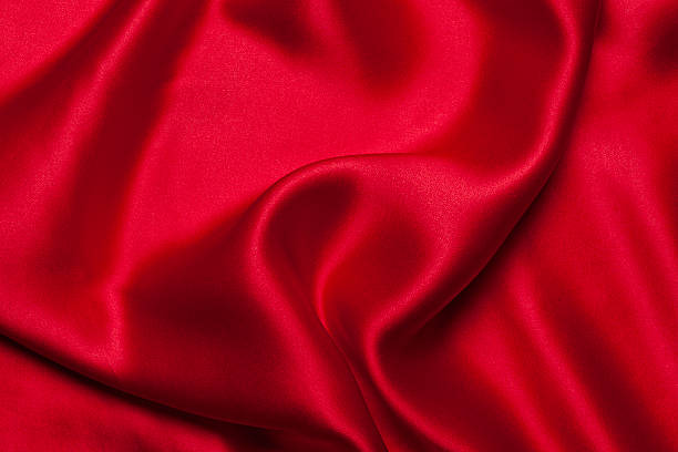 istock A close-up of a red silk cloth 183321116