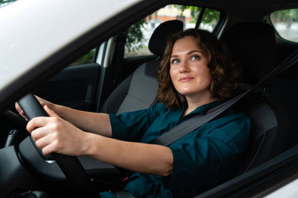 istock Woman driver is sitting in the car. 1833216933