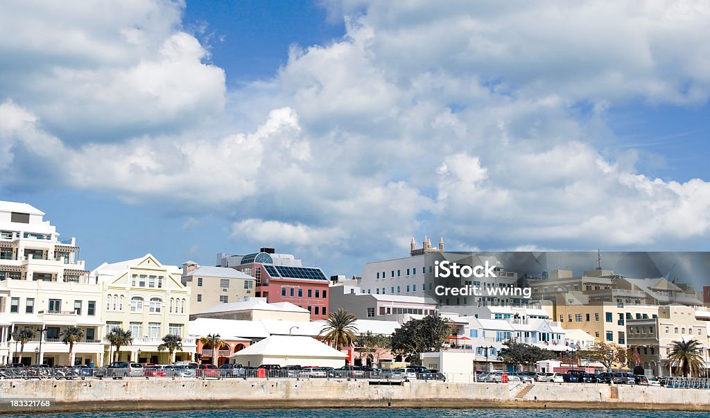 Hamilton, Bermuda, Ferry View Hamilton, Bermuda viewing Front Street from a ferry. Blue sky and clouds. Bermuda Stock Photo