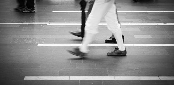 istock Pedestrian on the rush hour crossing cobblestone road 183321864