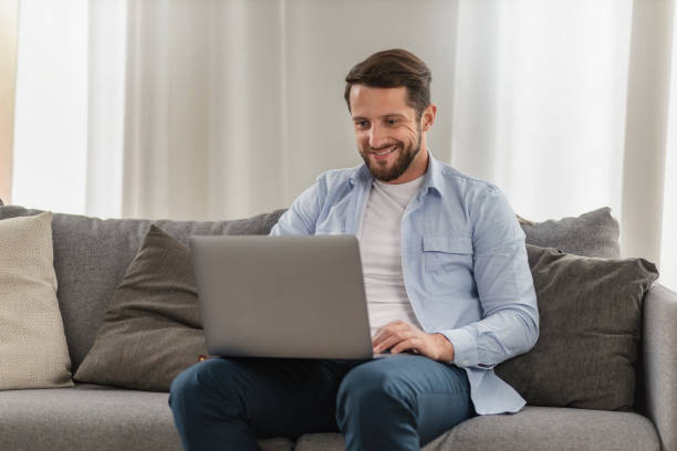 istock Man entrepreneur using laptop working at home 1833221092
