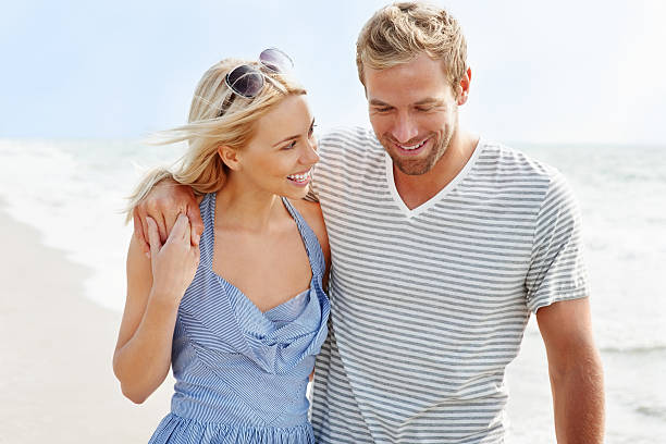 istock Romantic young couple spending time at the beach 183322186