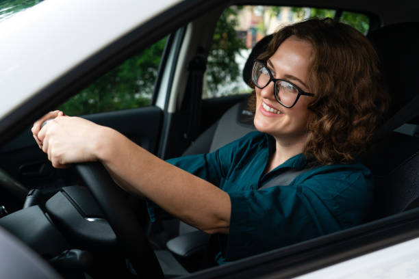 istock Woman driver is sitting in the car. 1833223717
