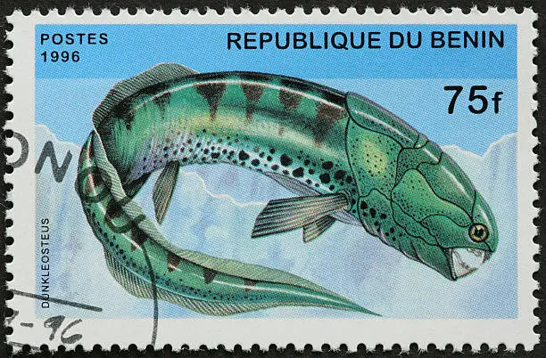 Photo of dunkleosteus prehistoric fish on a stamp