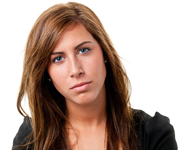 istock Serious Young Woman Headshot Portrait 183322462