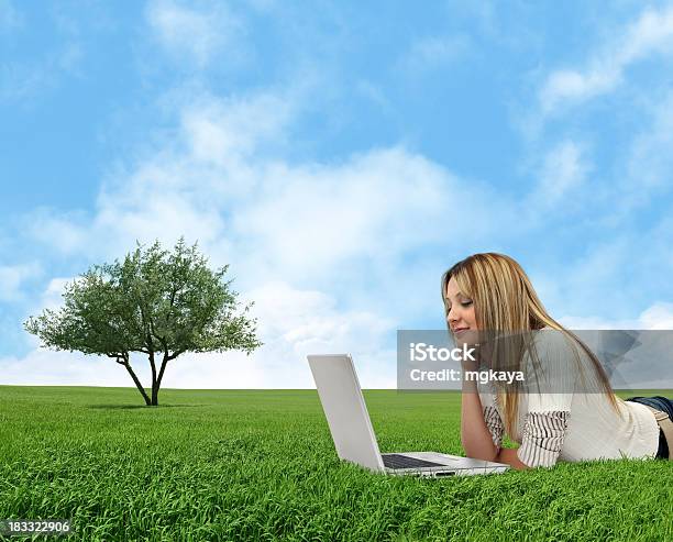 Using Computer In Nature Stock Photo - Download Image Now - 20-29 Years, Adult, Adults Only