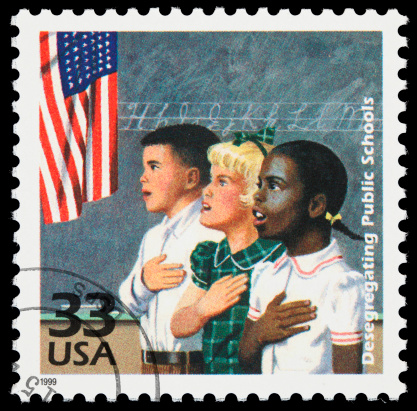 United States postage stamp marking the integration of the public school system in the 1950s.
