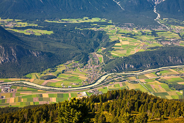 istock overlooking a valley in the alps 183323772