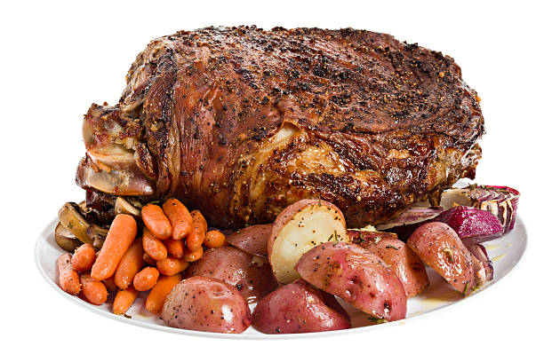 istock Roasted Leg Of Lamb With Trimmings Isolated 183323887