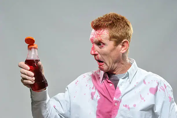 Photo of Man stained by ketchup bottle