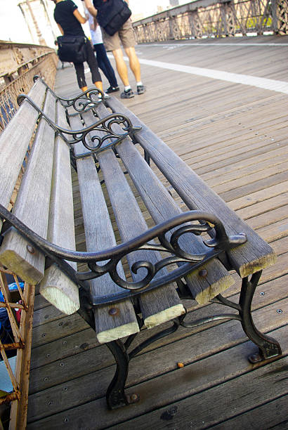 istock bench on brooklyn bridge New York 183324691