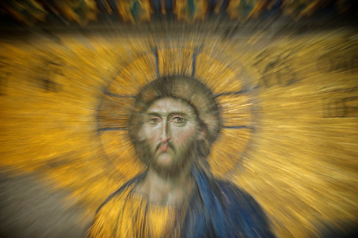 Zoom effect puts emphasis on the eyes of a Byzantine portrait of Jesus Christ