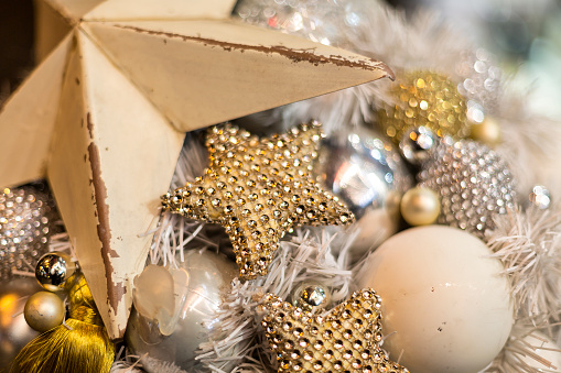 Silver and gold coloured Christmas Tree ornaments at a market stall in Budapest