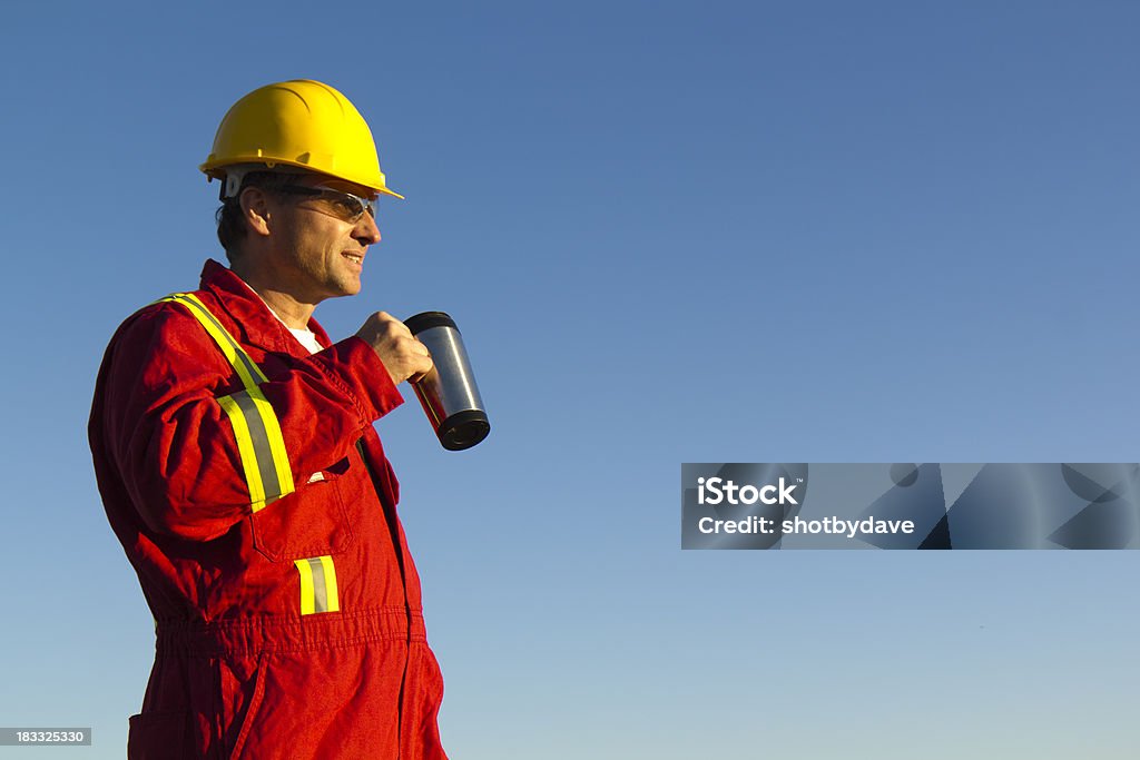 Coffee Time A royalty free image from the construction industry of a construction worker taking a coffee break. Coffee - Drink Stock Photo