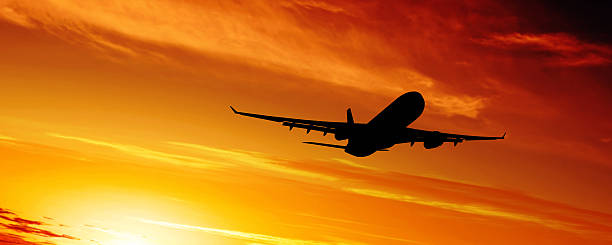 istock XL jet airplane silhouette 183325920