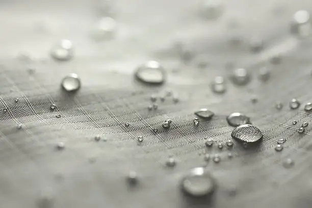 Gray waterproof nylon fabric; very narrow depth of field.See related: