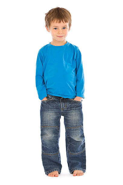 istock Young boy wearing blue on white background 183326506