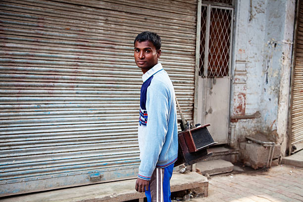 istock indian shoeshine boy 183328611