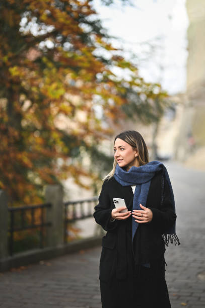 istock Young influencer in a city using mobile phone. 1833288313