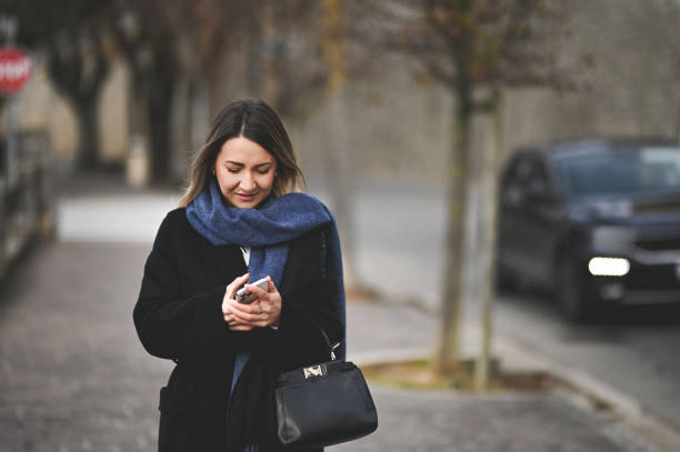 istock young business woman going for a work. 1833289889