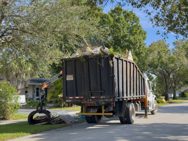 Bulky junk loading on steel waste trailer in Lima OH